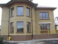 Частный дом в Харькове цвет окон Rehau Золотой Дуб